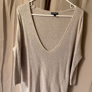 Express V-neck crocheted sweater. 3/4 inch sleeves. Size: Medium